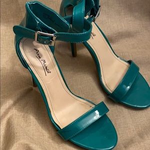 Green stiletto heels sandals